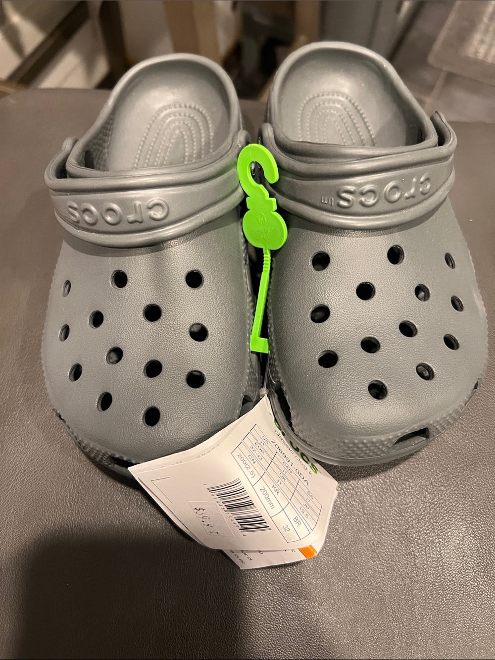 CROCS Kids Classic Clog in Gray with Green Tag